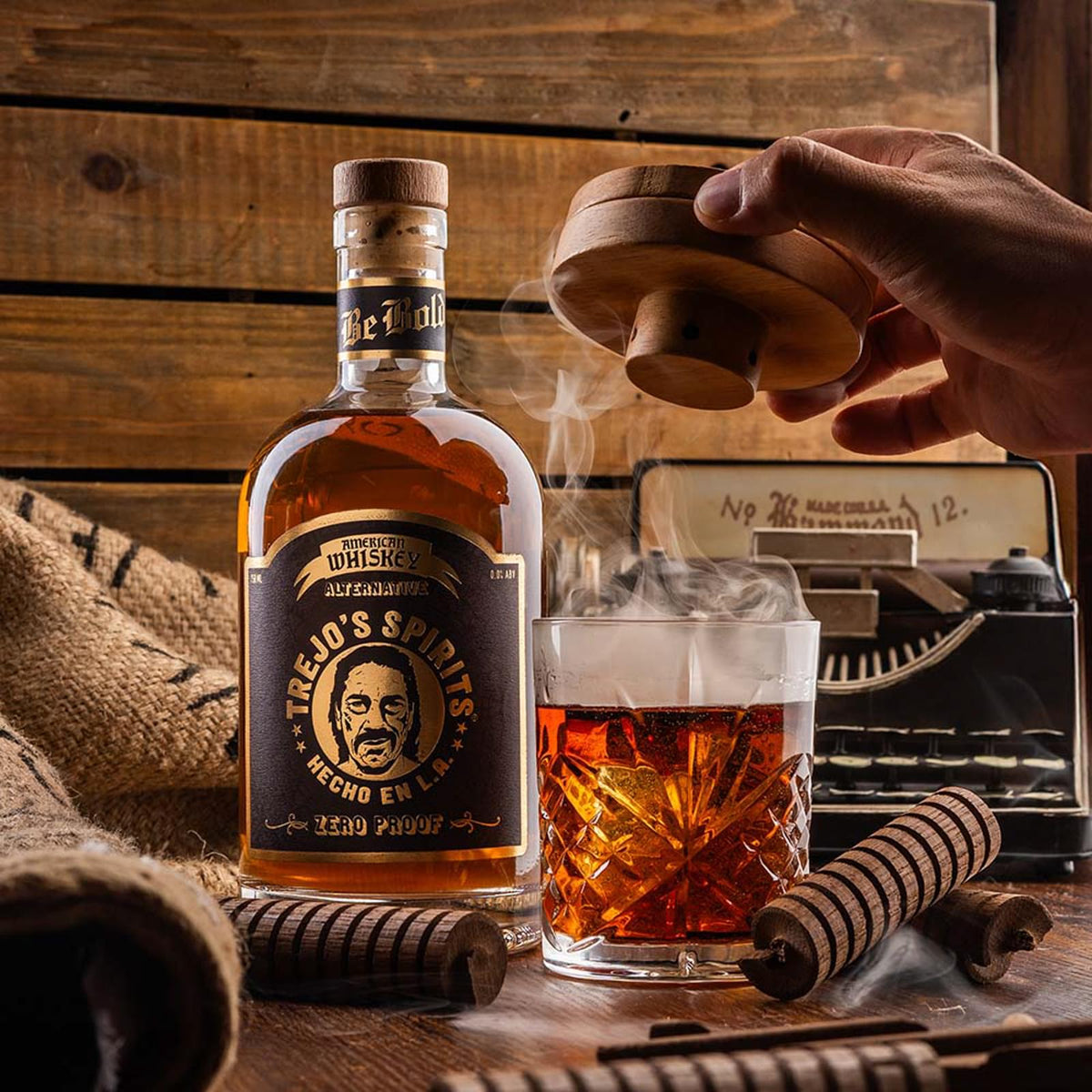American Whiskey Alternative bottle with a smoked Old Fashioned